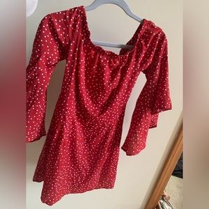 Adorable red poka-dot dress like new. Zipper back tapered waist